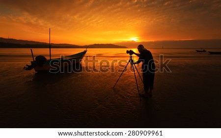 a fisherman boat and photography at the beach. image might contain softness and little noise due to long exposure