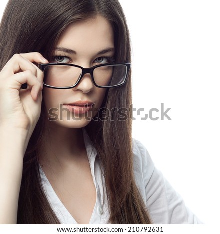 closeup portrait of attractive  caucasian  woman brunette isolated on white studio shot lips  face hair head and shoulders looking at camera glasses businesswoman