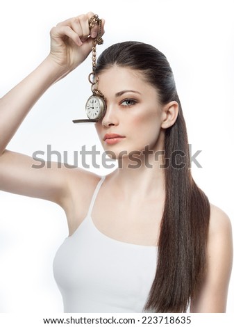 closeup portrait of attractive  caucasian  woman brunette isolated on white studio shot lips  face hair head and shoulders looking at camera watches time