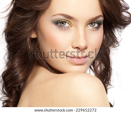 closeup portrait of attractive  caucasian  woman brunette  studio shot lips face hair head and shoulders looking at camera skin