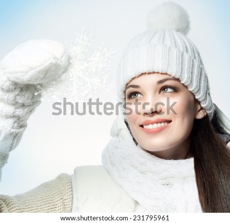 closeup portrait of attractive  caucasian smiling woman brunette isolated on white studio shot lips toothy smile face hair head and shoulders snowflake winter christmas