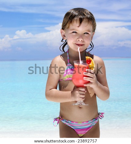 little girl on the beach drinking exotic cocktail, sea, ocean, bikini, summer, tropical, outdoors, looking at camera