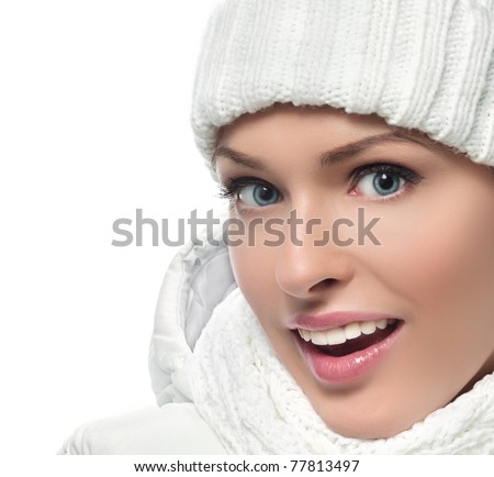 stock photo : beautiful woman in warm clothing on white background smiling