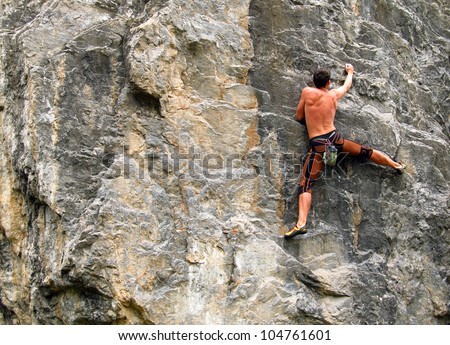 A young climber on the wall.
