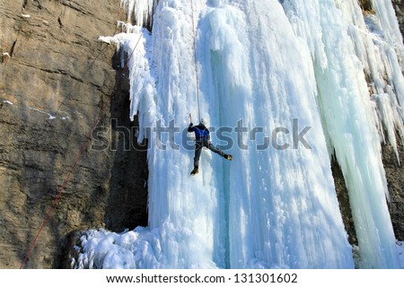 Ice climbing the waterfall.