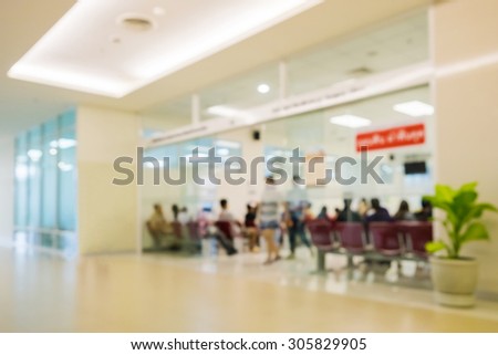 sliding glass door hospital medical place people waiting blurred
