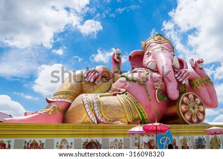 Ganesh big statue pink color blue sky sleep at wat saman, chachoengsao, thailand