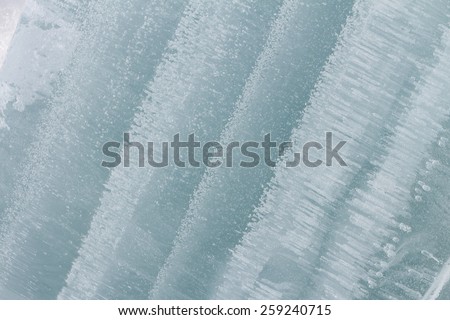 Fragment of an ice block on the river in the spring