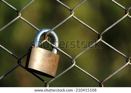 The lock and the fence.