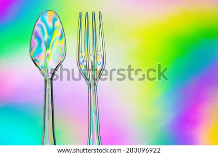 Amazing color of white light pass through clear plastic spoon, clear plastic fork and CPL filter.
