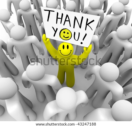  A smiley-faced yellow person stands out in a crowd holding a sign reading Thank You