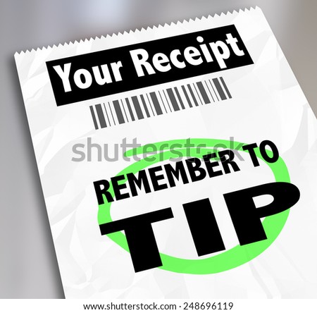 Remember to Tip words on a paper receipt or bill from a restaurant, hotel or store reminding you to add gratuity to your payment for great service rendered