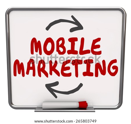 Mobile Marketing words written on a dry erase board to illustrate modern company strategy to sell to customers via apps on mobility devices such as smart or cell phones and tablets