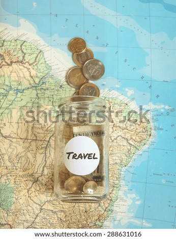 Filtered image of travel money jar on map