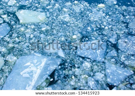 Bright blue spring drifting blocks of ice background
