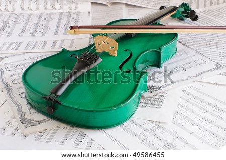 Green violin and musical score