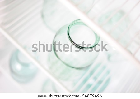 Closeup of a glass jar in the fridge