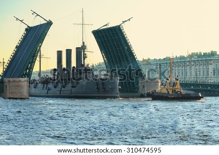 Passage of cruiser Aurora under the Palace Bridge, St. Petersburg, Russia