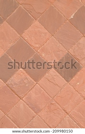 beige and brown floor tiles