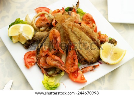 Delicious fish with shrimp and squid fried.
