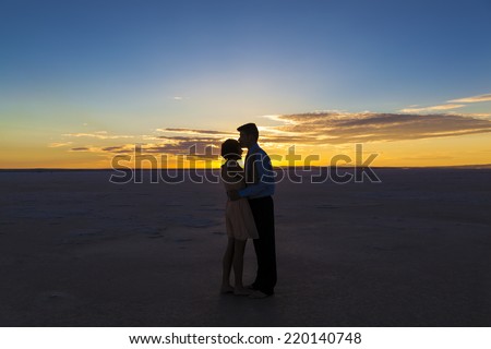 Silhouette of a  couple in love at sunset, Salt Lake-Turkey.