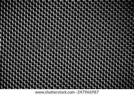 Black Carbon fiber texture closeup background. Industrial carbon fiber texture