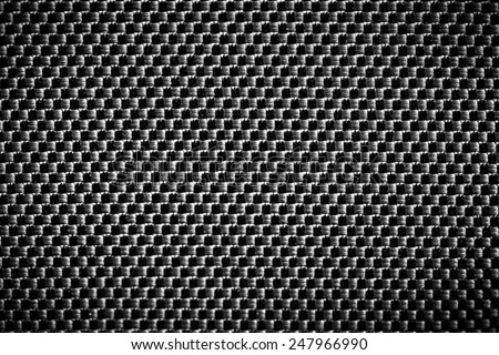 Black Carbon fiber texture closeup background. Industrial carbon fiber texture