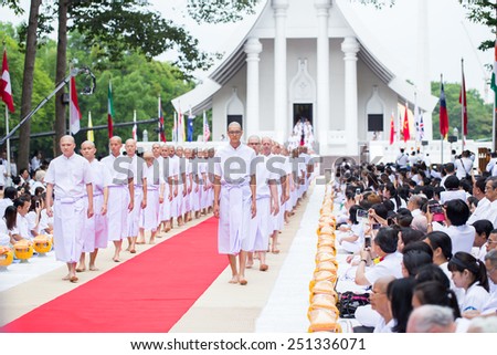 Pathum Thani, Thailand - April 13, 2014 : Temple Ordained Summer Edition Male Thailand at the age of 20 years to join the priesthood. To replace your parents Ceremonies held Wat Phra Dhammakaya