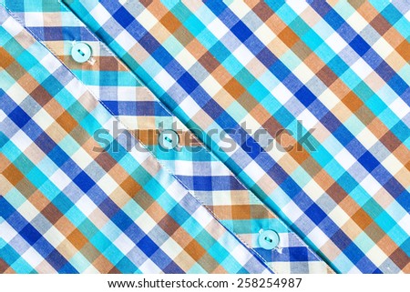 Colorful checkered shirt, shirt fabric plaid texture. Geometric background