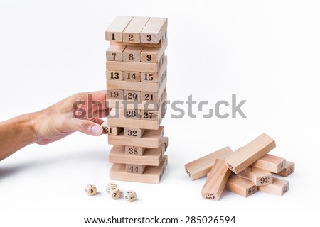hand man play blocks wood, tower wooden game on white background.