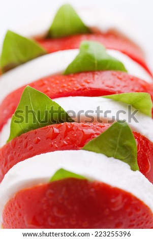 Caprese salad with mozzarella, tomato, basil striped tricolor salad caprese, mozzarella, tomato, basil striped tricolor