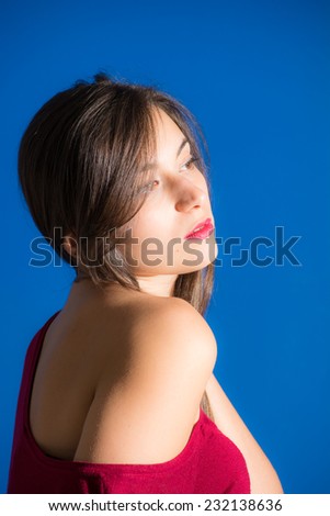Woman show her beautiful back side and face