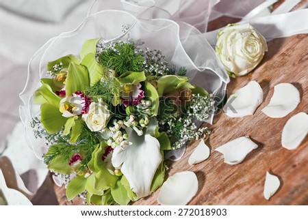 Bouquet of flowers on an old wooden base