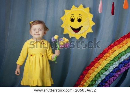 little girl with flowers near the sun and rainbow color
