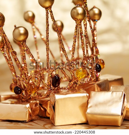 Sparkling gold crown for a carnival with candies