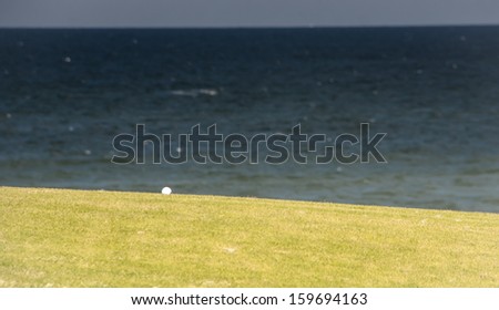 Golf ball with atlantic ocean