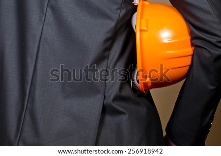 Men in suit with safety helmet