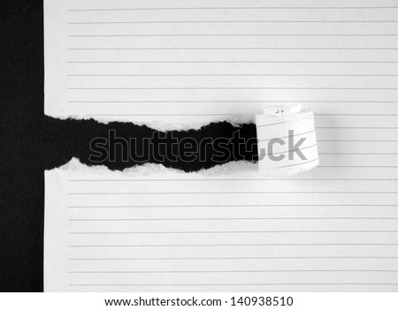Torn notebook page