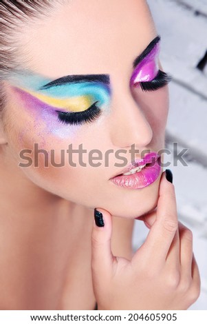 Beauty woman with art makeup