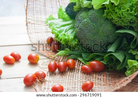 Vegetable bouquet on wood Communication to health.