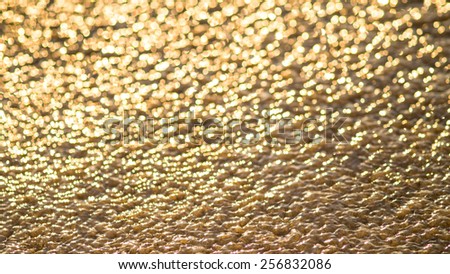 Bokeh golden lights on background (gold, sand)