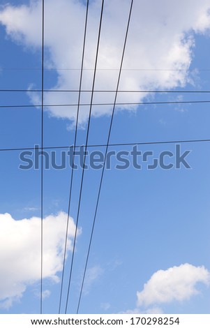 High Level Cumulus Humilis Clouds with Utility Lines