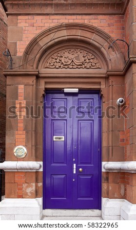 Purple door attached to a bank in Midleton, Ireland