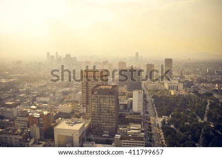 Mexico city industrial part covered in haze on sunset seen from the Latin American Tower, Mexico