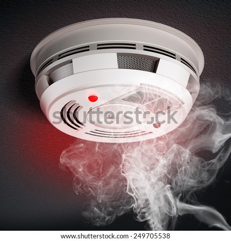 Smoke Detector with red warning light sensing smoke