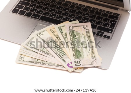 Open Laptop With Dollars money
