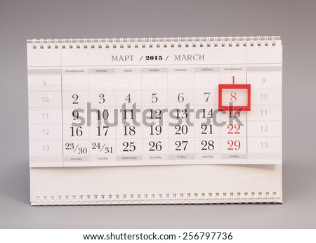 Calendar page with marked date 8 March of International Women\'s Day isolated on gray background