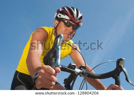 Picture of a man riding a racing bicycle