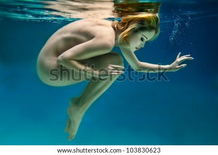 Nude Beautiful Girl Is Under Water
