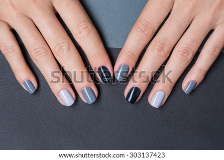 Female hands with a stylish neutral manicure